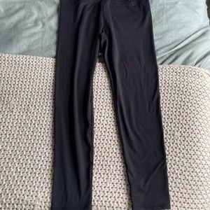 Black leggings made out of recycled material